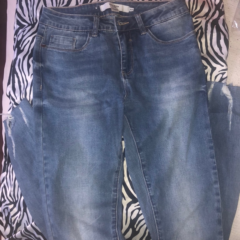 skinny jeans slightly ripped at bottom